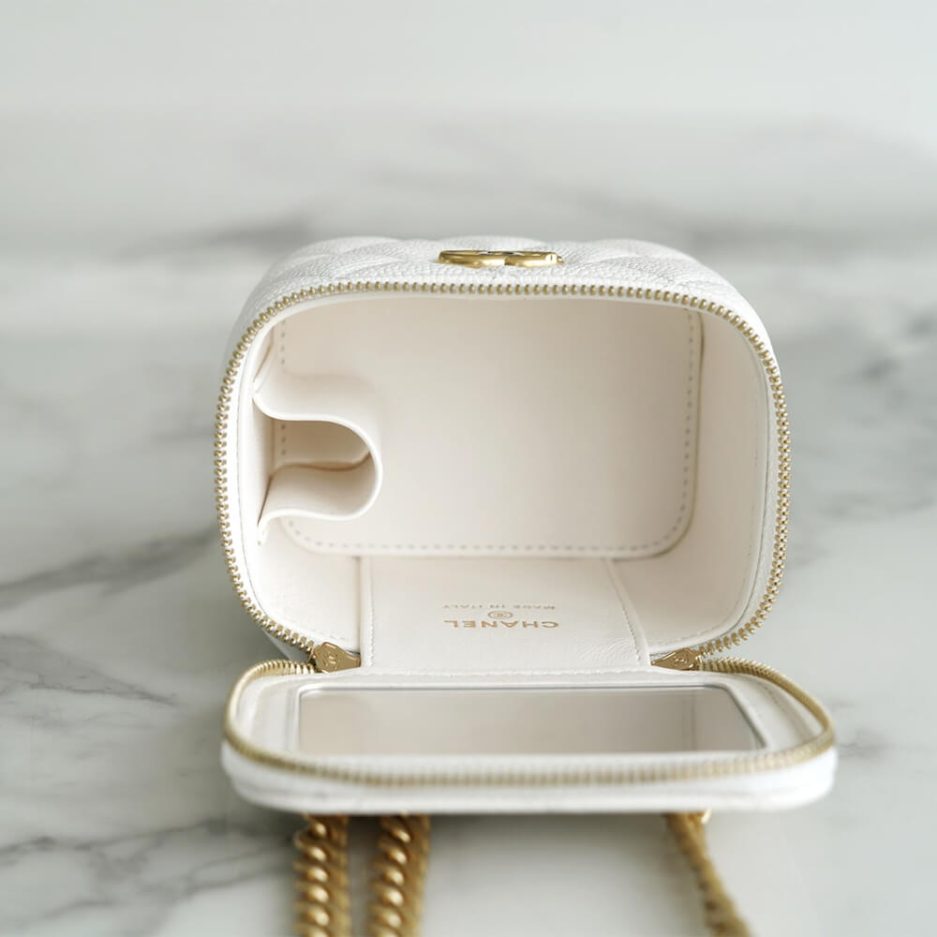 Ch*el small gold ball makeup bag
