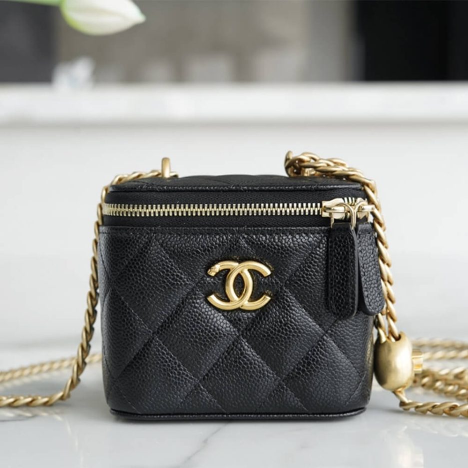 Ch*el small gold ball makeup bag