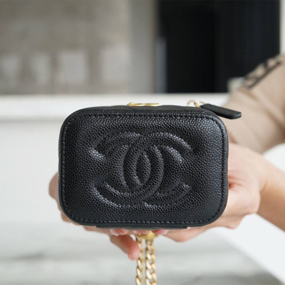 Ch*el small gold ball makeup bag