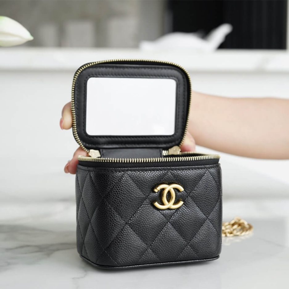 Ch*el small gold ball makeup bag